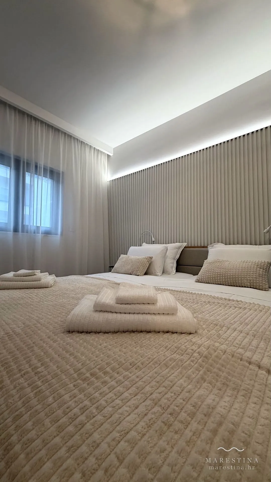 Second bedroom with double bed, wardrobe and workspace