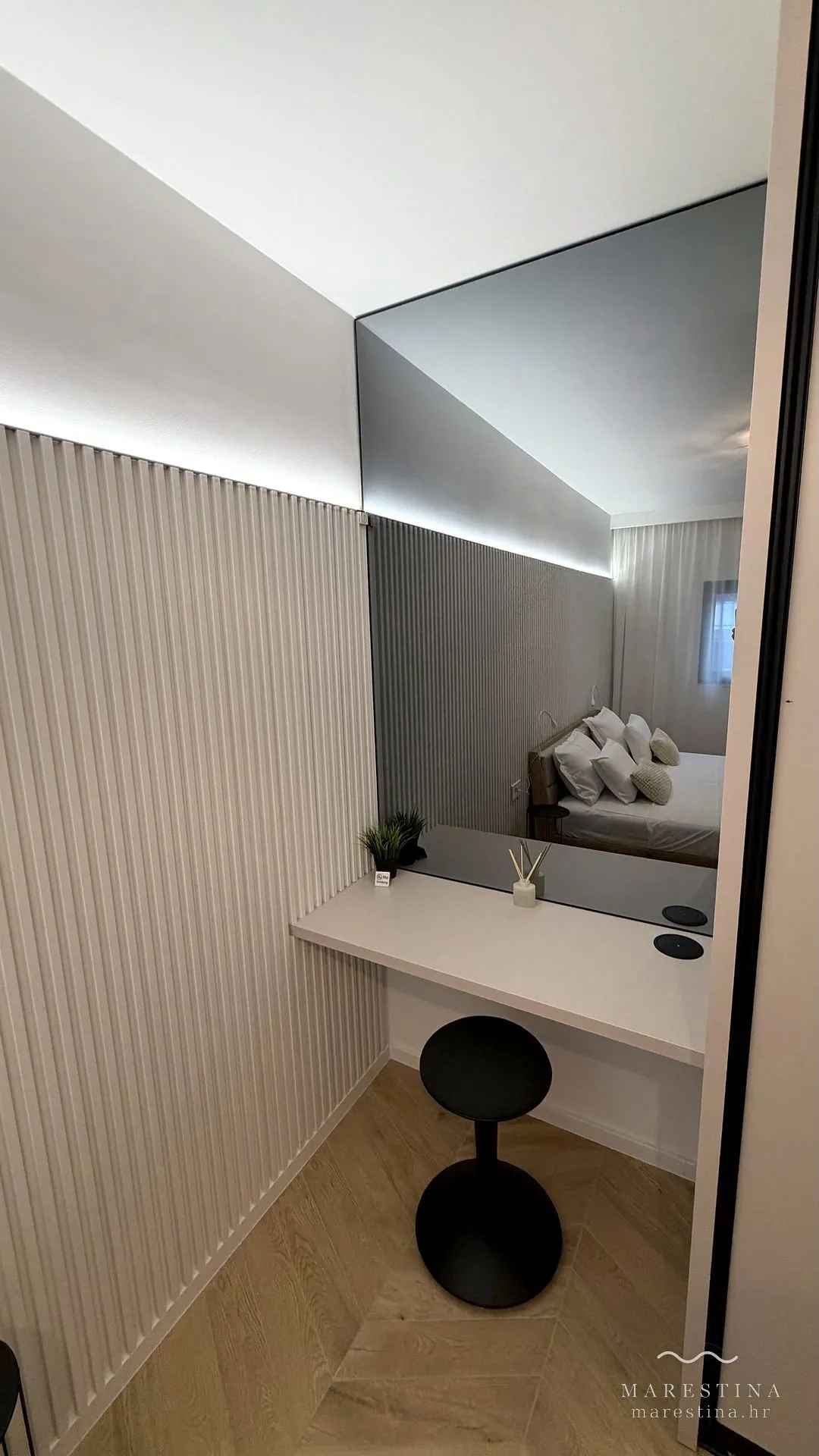 Second bedroom with double bed, wardrobe and workspace