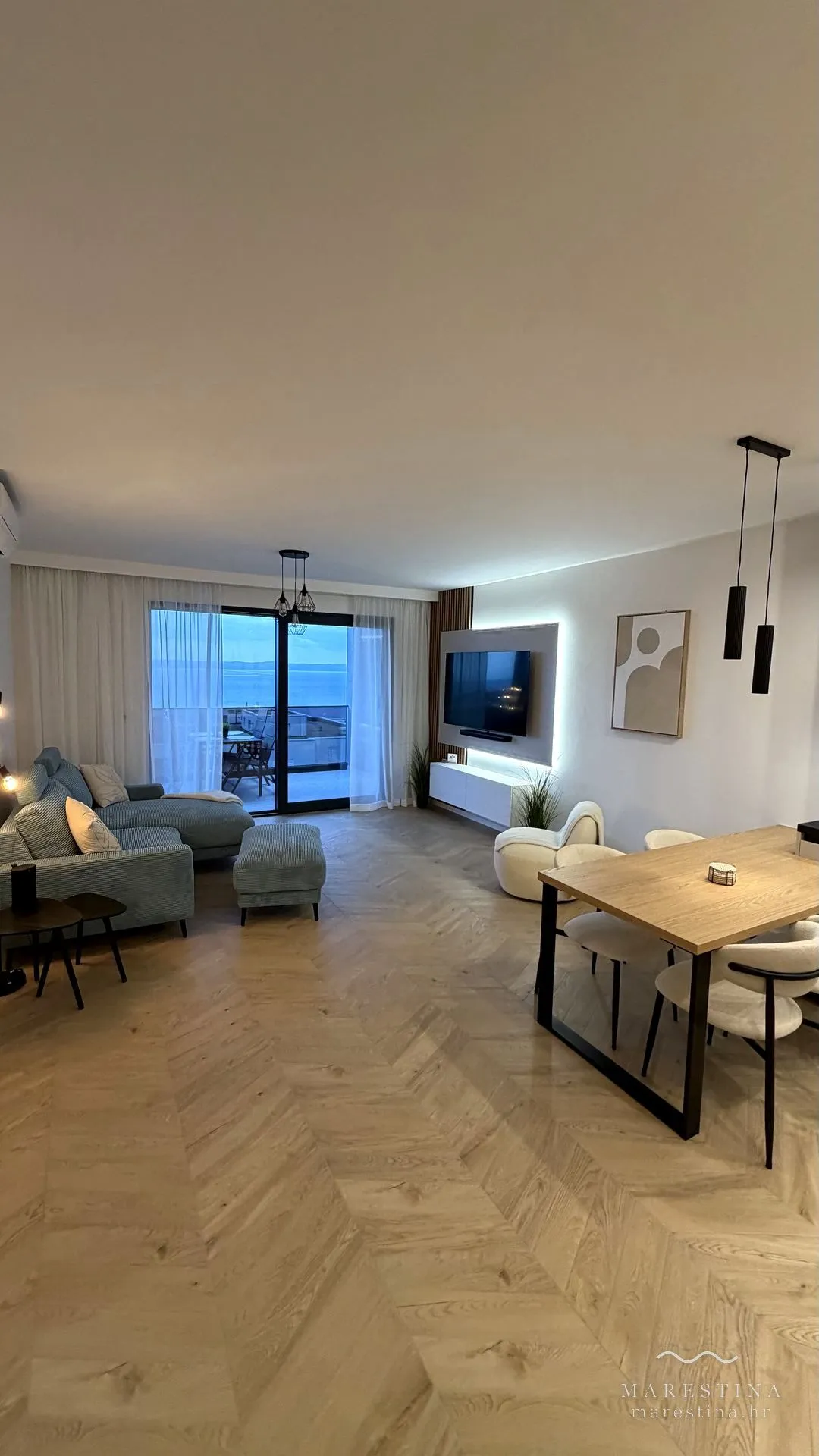 Open-plan living and dining area at Marestina