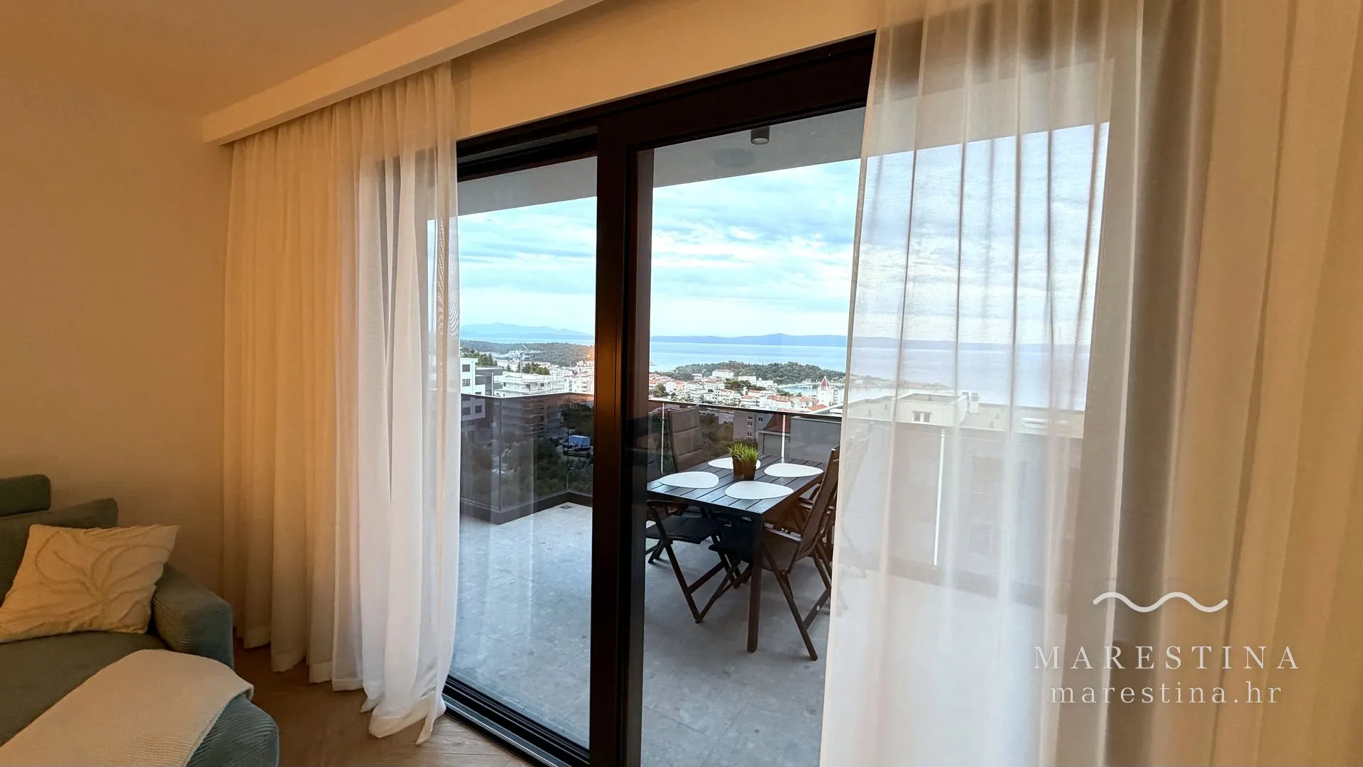 Open-plan living and dining area at Marestina